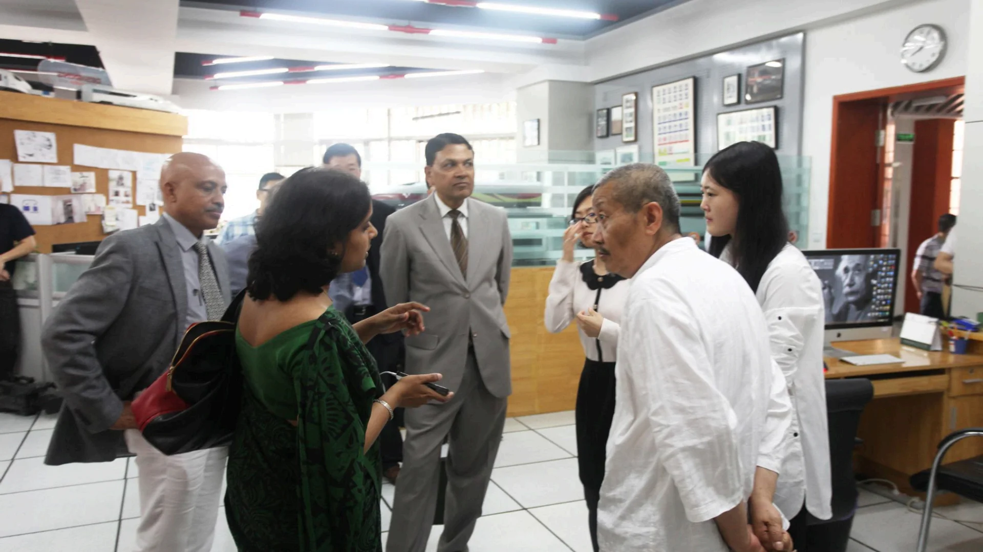 Representatives from the Indian Railway Commission inspect the school's rail transit laboratory
